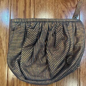 LLani by Anthropologie copper striped small leather clutch
